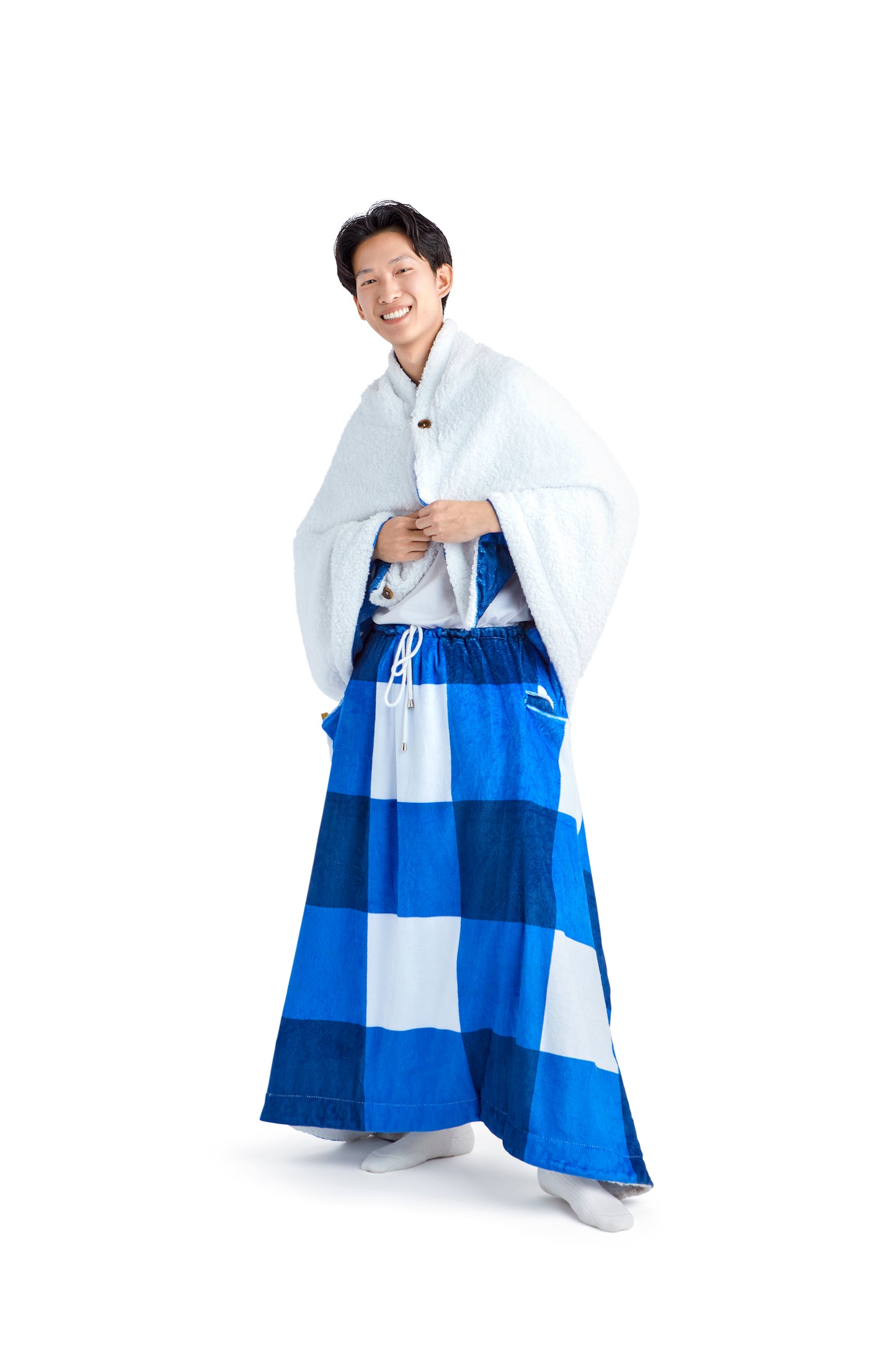 Warmzie wearable blanket - model wearing warmzie - hoodie blanket- heated blanket- flannel - sherpa