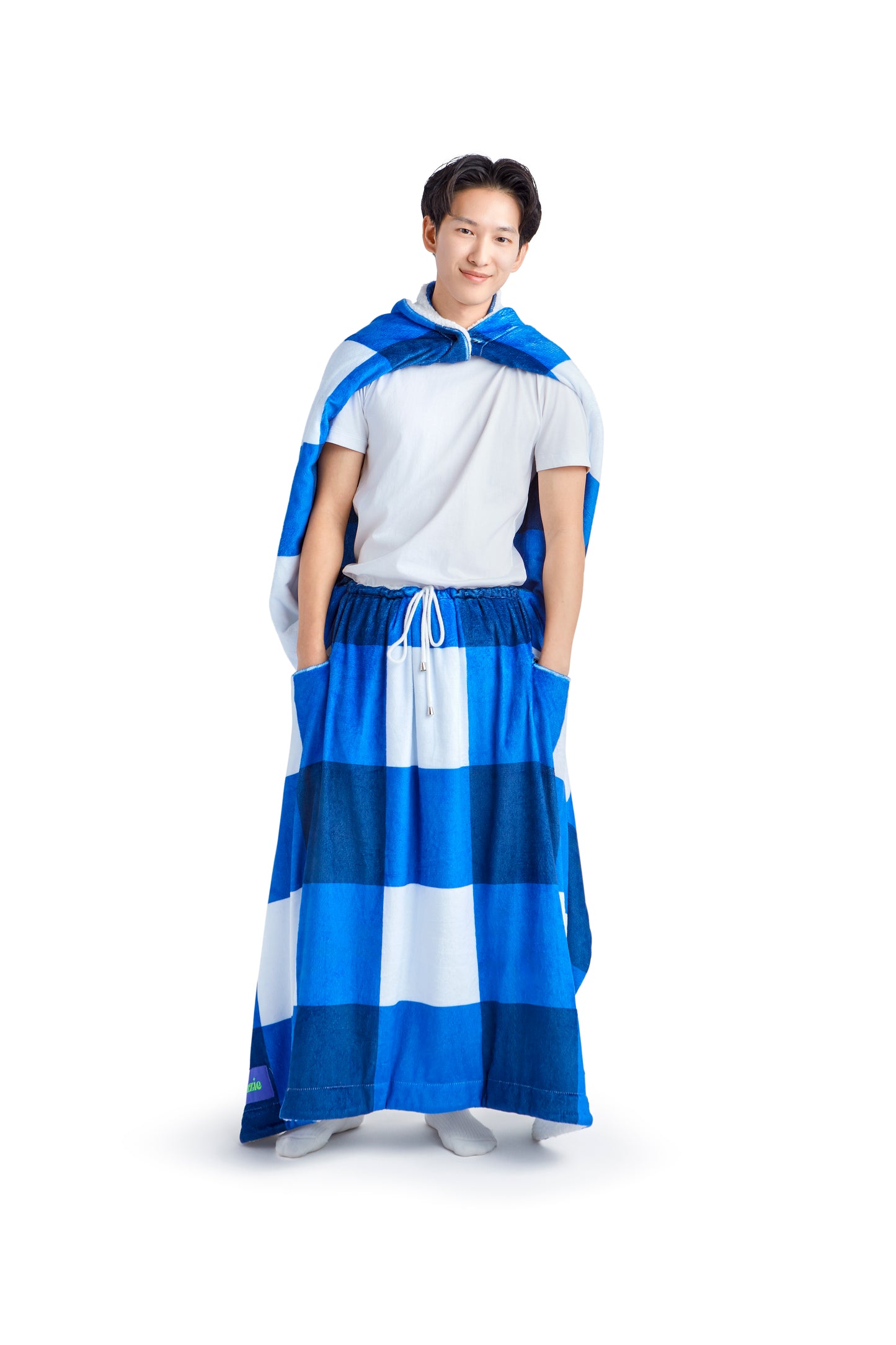 Warmzie wearable blanket - model wearing warmzie - hoodie blanket- heated blanket- flannel - sherpa - cape